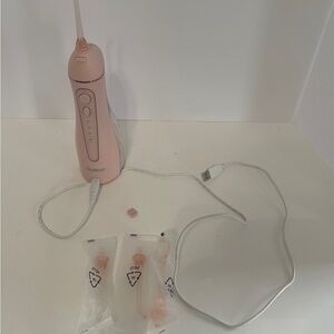 Oralfree Portable Cordless Water Flosser Pink Oral Irrigator with USB and Tips